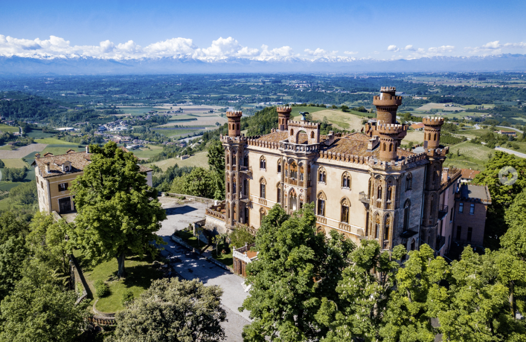 Built on the foundations of a medieval fortress, this 19th-century Italian castle’s decorative flourishes are an exuberant celebration of the Gothic Revival style. This imposing neo-Gothic castle is set on a rise surrounded by the Barolo vineyards of the Langhe, a UNESCO World Heritage Site in Piedmont, Italy. The castle was built in the 15th century on the site of a Roman fortress. Its present form dates from the mid-1800s, designed by architect Giovanni Battista Schellino for Turin noblewoman Maria Allara Nigra. (Picture from the Luxury-Defined-Website)